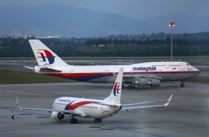 Malaysia Airlines aircrafts taxi on the runway at Kuala Lumpur International Airport in Sepang outside Kuala Lumpur